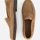 The JOHN LOBB Bath Nubuck Loafer, a pair of tan suede handmade men’s loafers with brown soles, is displayed from the side and top views on a white background.