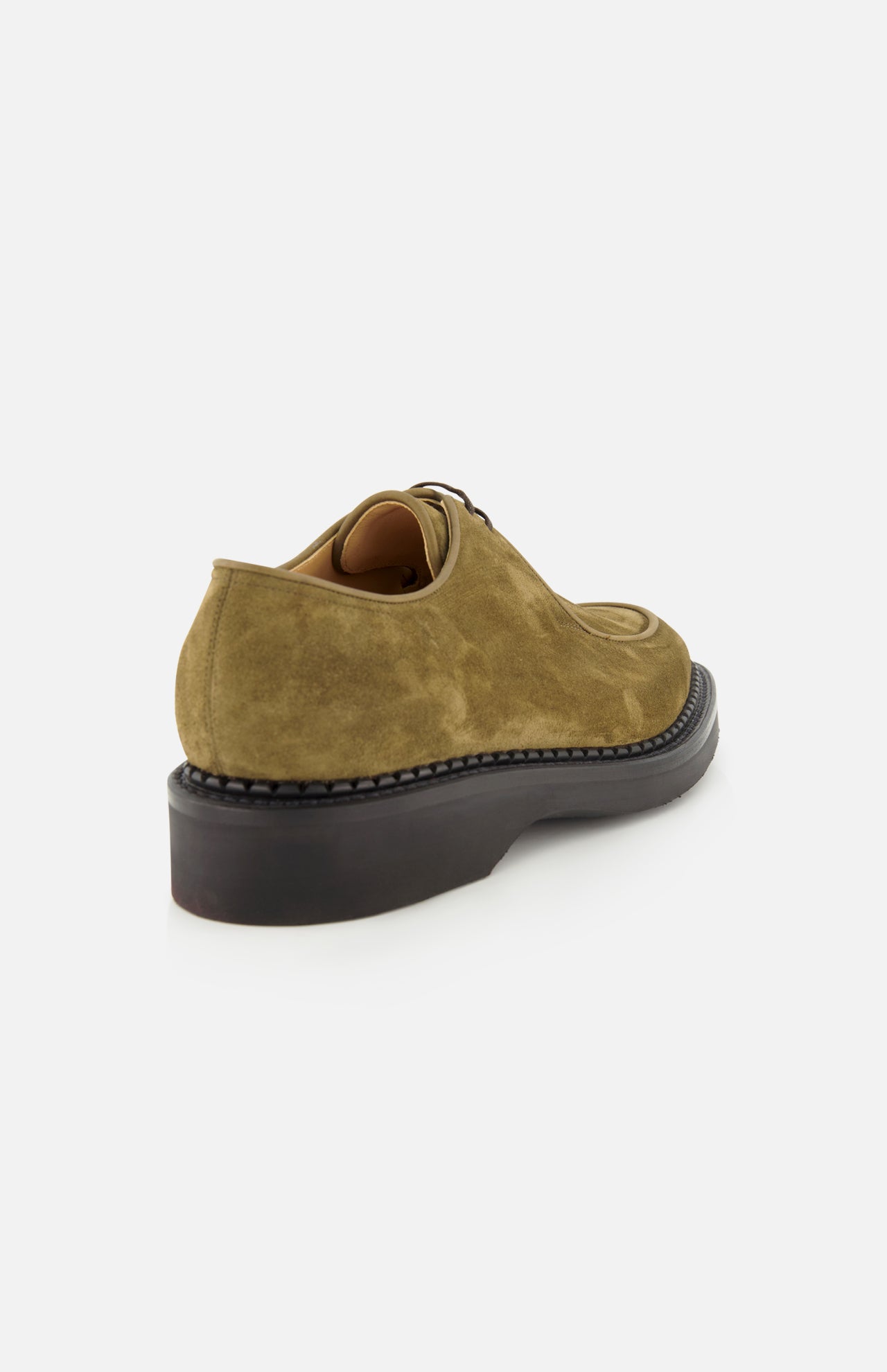 The Smith Suede Loafer by JOHN LOBB, rendered in olive-green suede and inspired by classic English creepers with a thick black sole, is shown from the back on a white background.