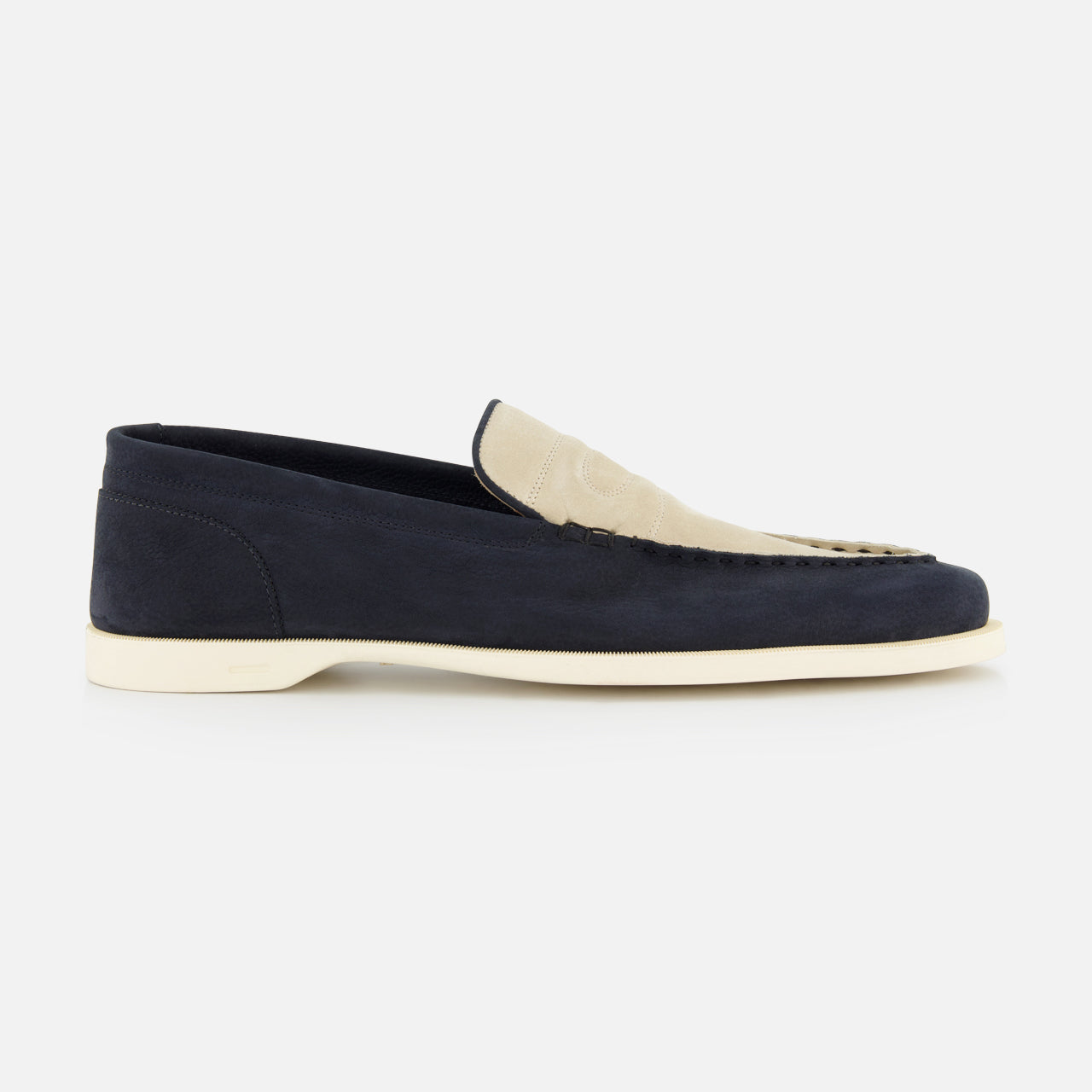 The JOHN LOBB Pace Suede 2 Tones Loafer features navy blue suede, a cream leather upper panel, and a white super flex rubber sole, displayed in profile against a plain white background.