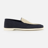 The JOHN LOBB Pace Suede 2 Tones Loafer features navy blue suede, a cream leather upper panel, and a white super flex rubber sole, displayed in profile against a plain white background.