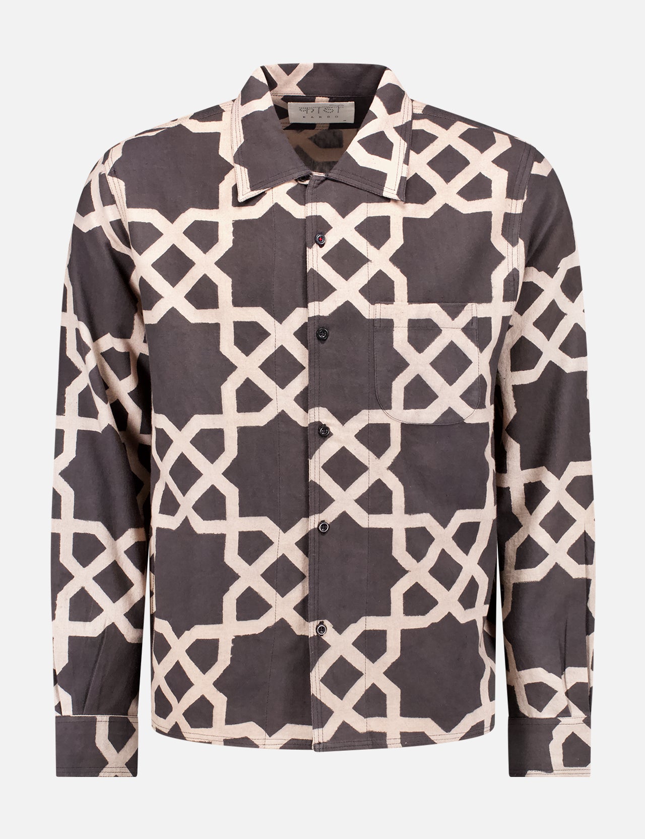 The KARDO Chintan Shirt is a navy, long-sleeve button-up with an abstract cream geometric Ajrakh block print on a black base, made with natural plant dyes. Displayed on a plain white background.