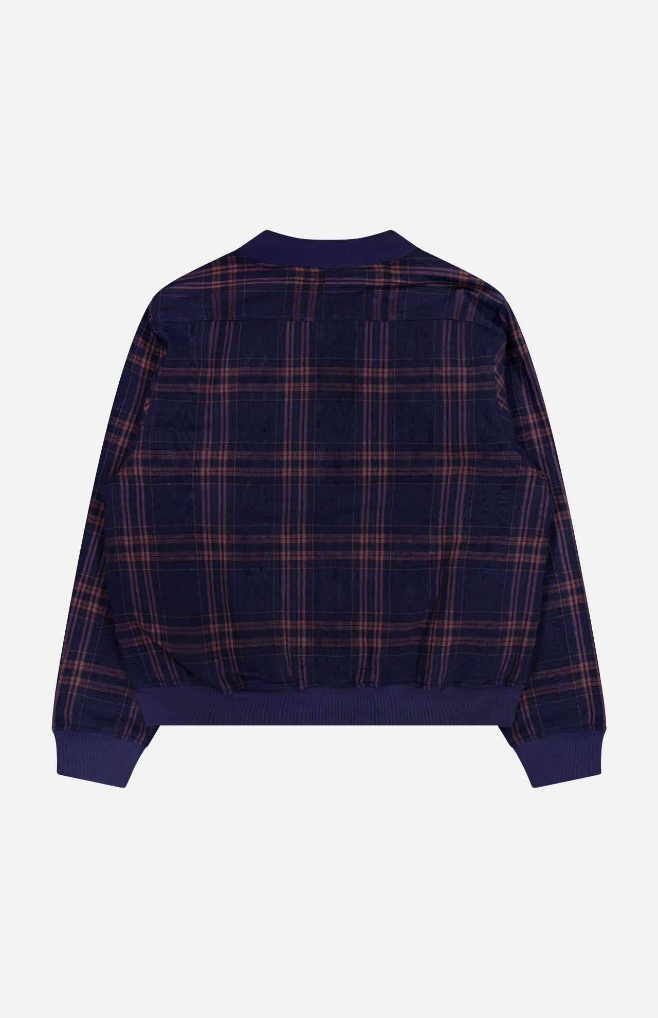 A back view of the KARDO Janesh Quilted Plaid Cardigan in navy blue, showcasing long sleeves with ribbed cuffs and a waistband. The cozy men’s cardigan features a quilted design with a plaid pattern of thin red and tan lines against a dark blue background, making it ideal for layering during cooler weather.