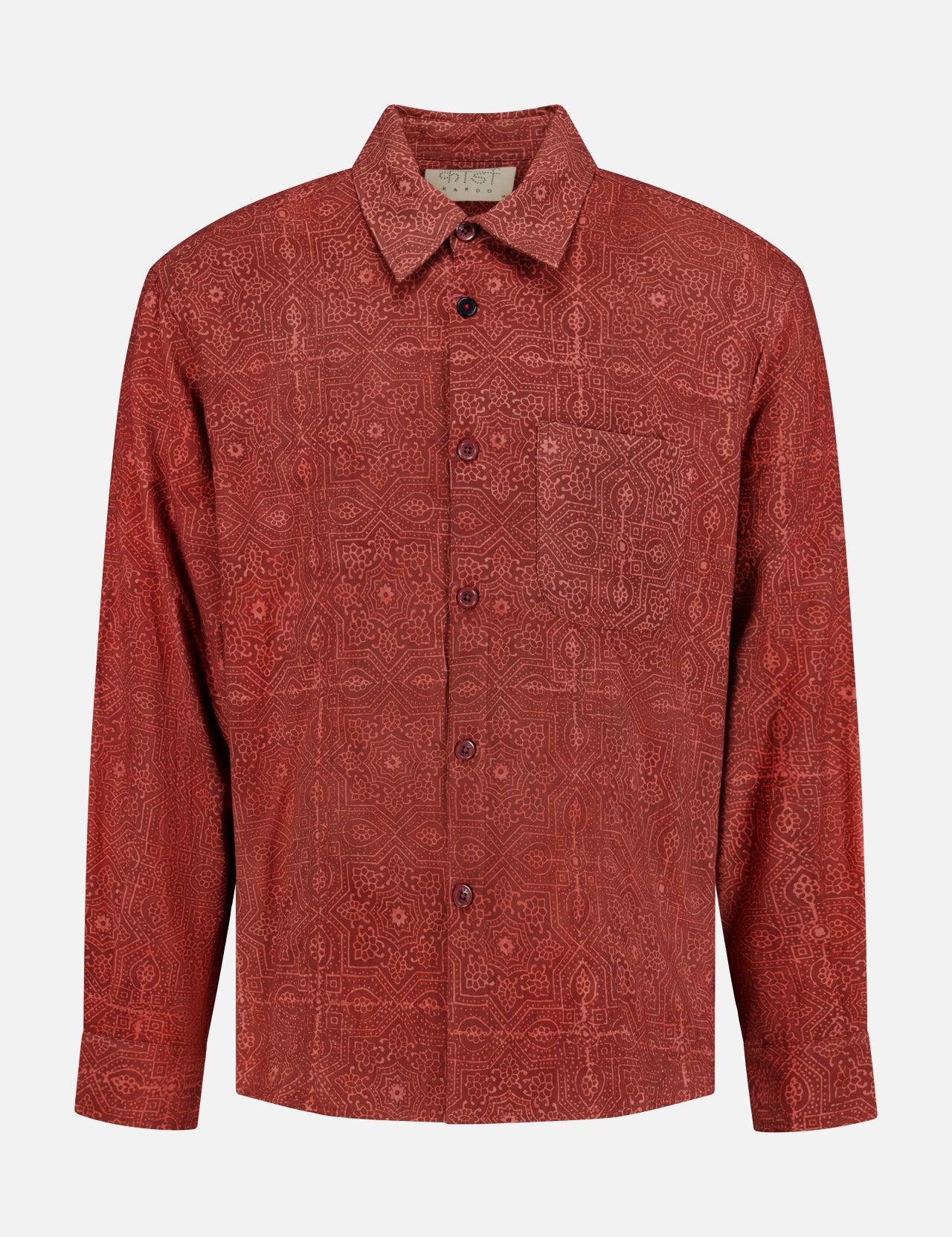 Introducing the Luis Oversized Long Sleeve Shirt by KARDO—a deep brick red cotton shirt featuring a subtle, intricate geometric pattern. This classic button-up style offers an oversized fit, classic collar, and chest pocket, blending timeless design with modern comfort.