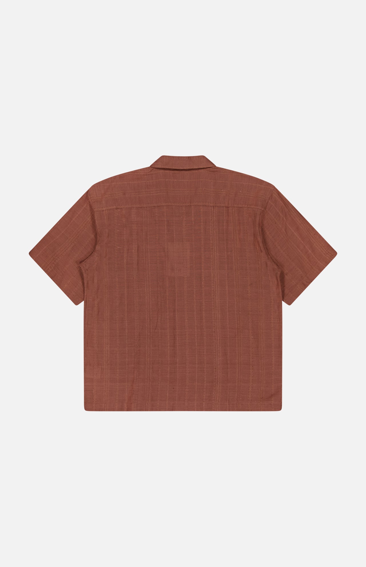 Back view of the KARDO Rohit Stripe Short Sleeve Shirt—an oversized, 100% cotton brown shirt with a subtle textured stripe pattern—shown on a plain white background.
