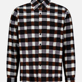 The KARDO Ronald Checkered Long Sleeve Shirt features a large plaid pattern in black, brown, and white. Made from 100% cotton, this button-up shirt includes a classic collar and buttoned cuffs, shown against a plain white background.