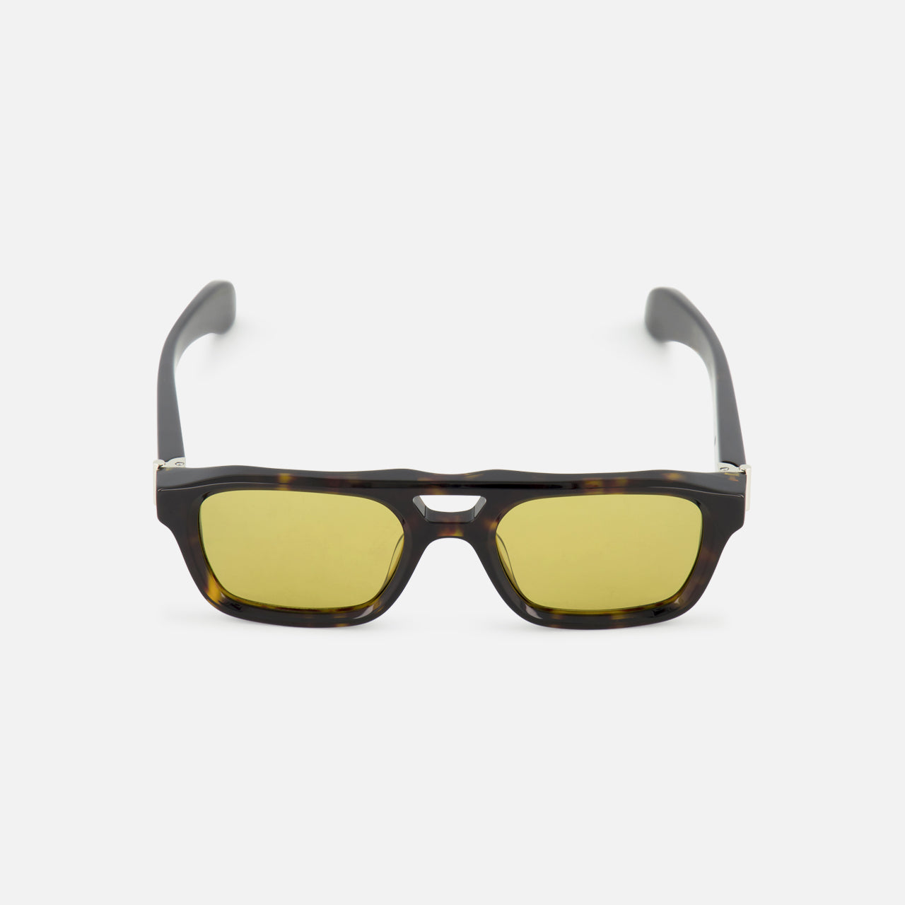 Alexander McQueen Pilot Brown Sunglasses by ALEXANDER MCQUEEN with dark brown frames and yellow-tinted lenses, shown on a white background.
