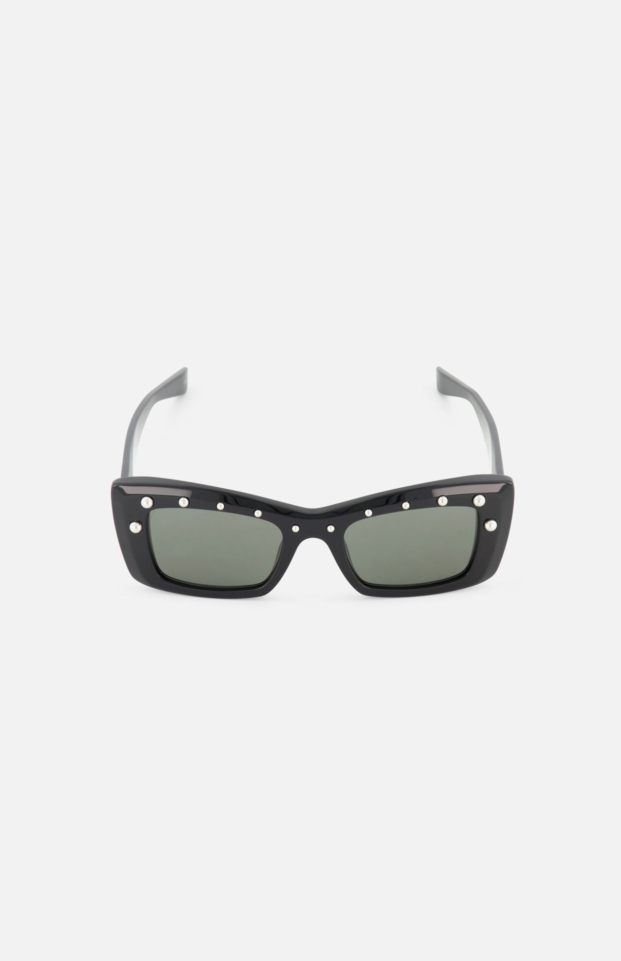 Alexander McQueen Cat Eye Black Sunglasses by ALEXANDER MCQUEEN feature metallic studs along the top and dark lenses, showcased on a plain white background.