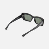 Alexander McQueen Cat Eye Black Sunglasses by ALEXANDER MCQUEEN, shown at an angle highlighting the left side and back. The black frame has dark lenses and one arm is engraved with “Moulin” in white. Set against a plain white background.
