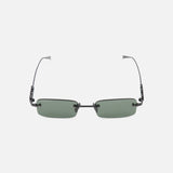 The Gucci Rectangular Black Sunglasses by GUCCI feature rimless green-tinted lenses and thin black arms, shown against a plain white background.