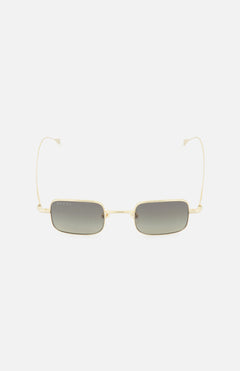 The GUCCI Square Gold Sunglasses feature a gold frame, dark tinted lenses, and thin metal arms. These unisex Gucci sunglasses are showcased against a plain white background.