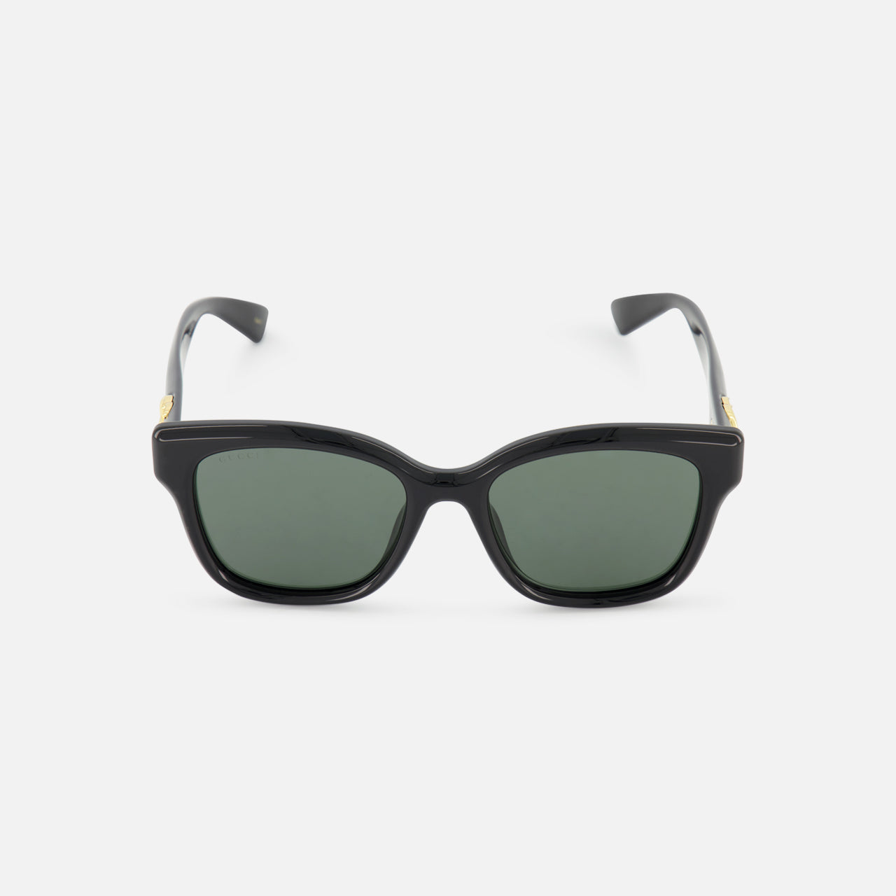 A pair of GUCCI Round Black Sunglasses with dark green lenses, displayed facing forward on a plain white background.