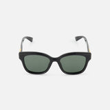 A pair of GUCCI Round Black Sunglasses with dark green lenses, displayed facing forward on a plain white background.