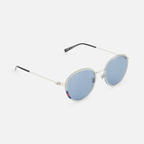 The Gucci Round Silver Sunglasses by GUCCI feature silver frames, light blue lenses, and black-tipped arms for a stylish unisex look, shown on a plain white background.