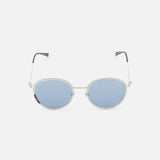 The Gucci Round Silver Sunglasses by GUCCI feature silver metal round frames, light blue tinted lenses, and black-tipped arms. These unisex sunglasses are displayed on a plain white background.