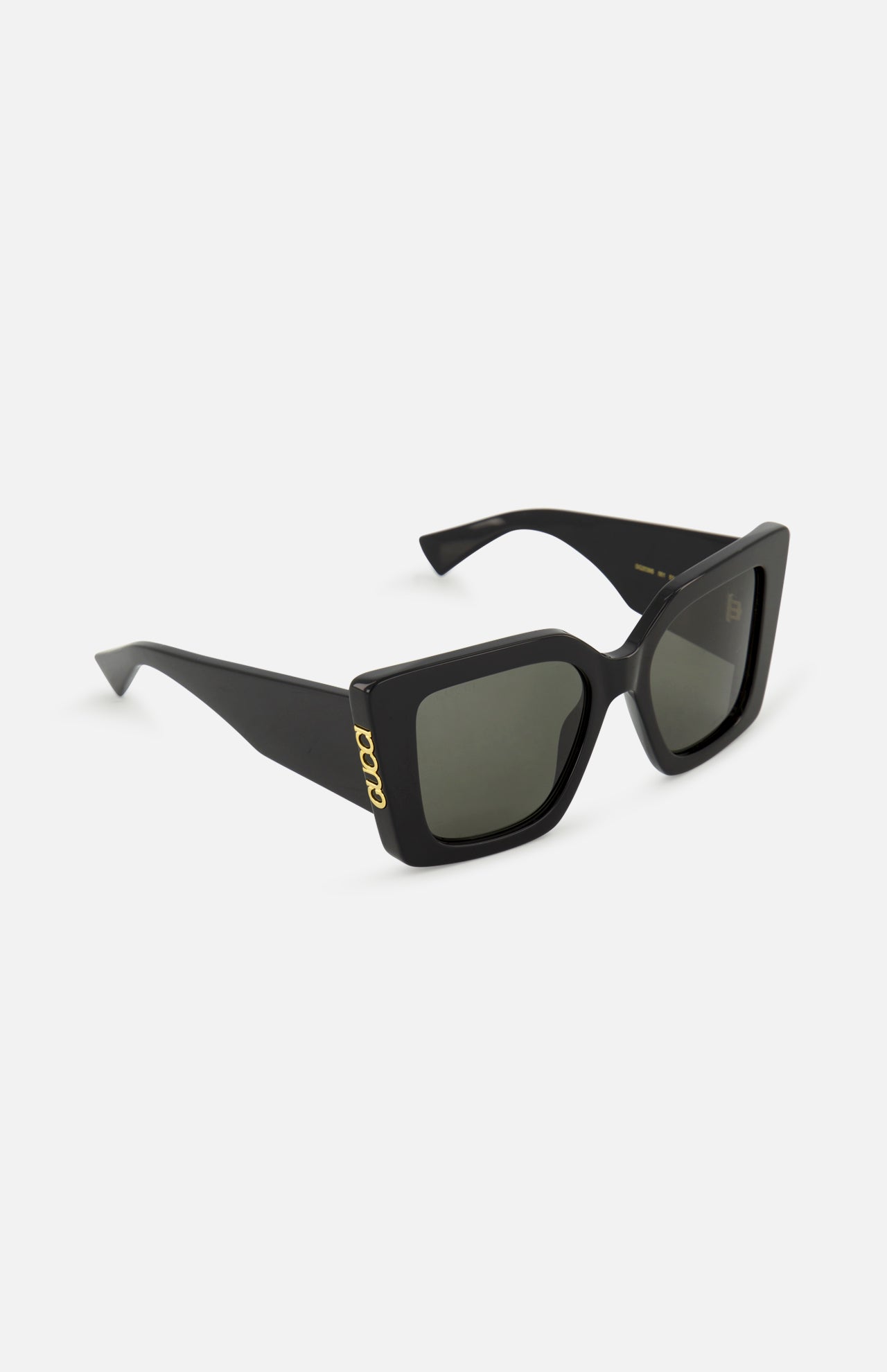 Gucci Butterfly Black Sunglasses by GUCCI feature retro-inspired square butterfly-shaped black frames, dark lenses, and a subtle gold logo on the temple, displayed against a plain white background.