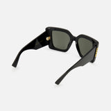 GUCCI Butterfly Black Sunglasses with retro-inspired thick frames, green-tinted lenses, and gold-tone temple accents are shown from a rear three-quarter angle against a plain white background.