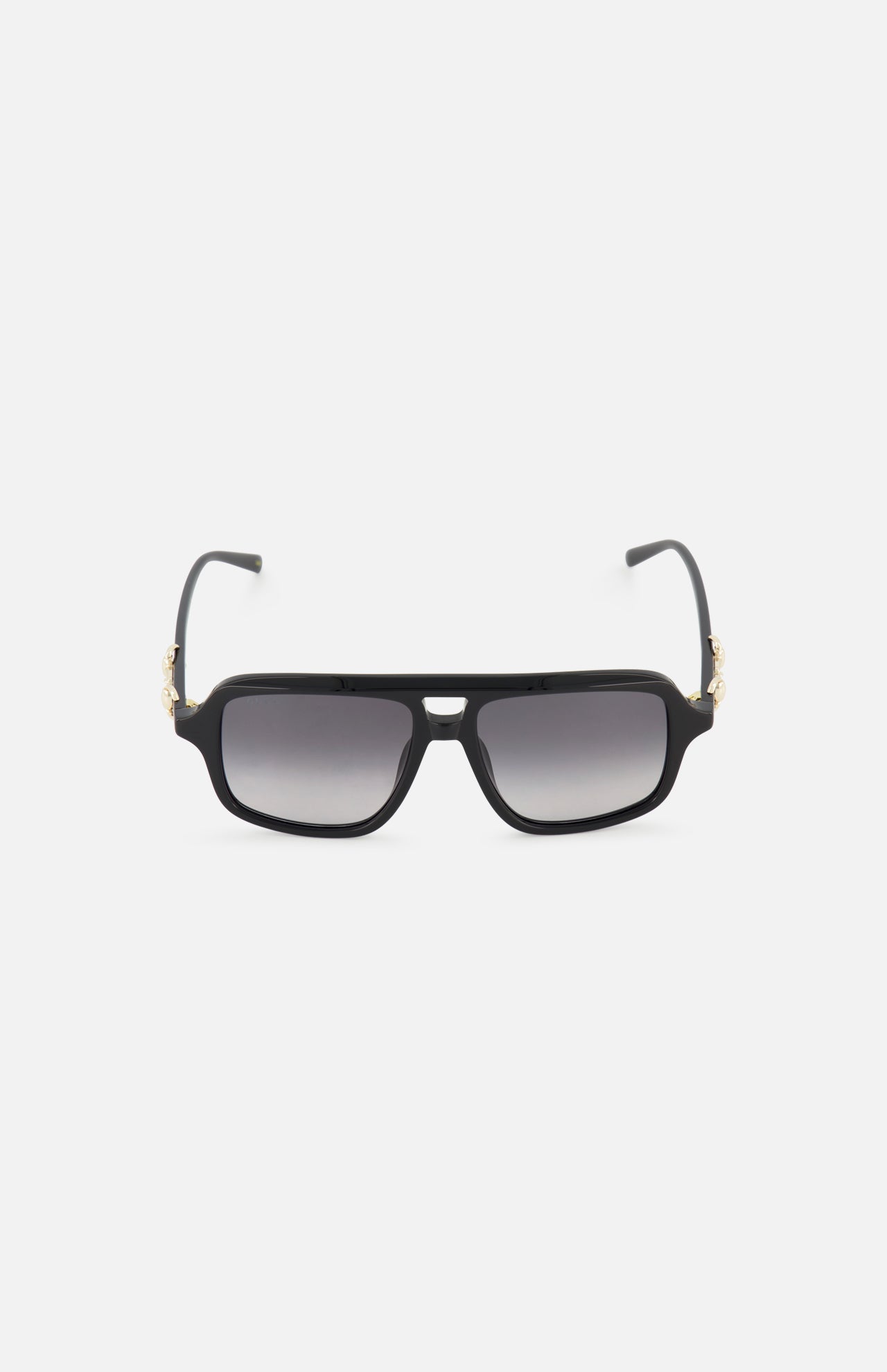 Gucci Aviator Black Sunglasses by GUCCI feature a rectangular black frame, gradient grey lenses, gold-tone horsebit hinge detail, and sleek black arms, shown on a plain white background.