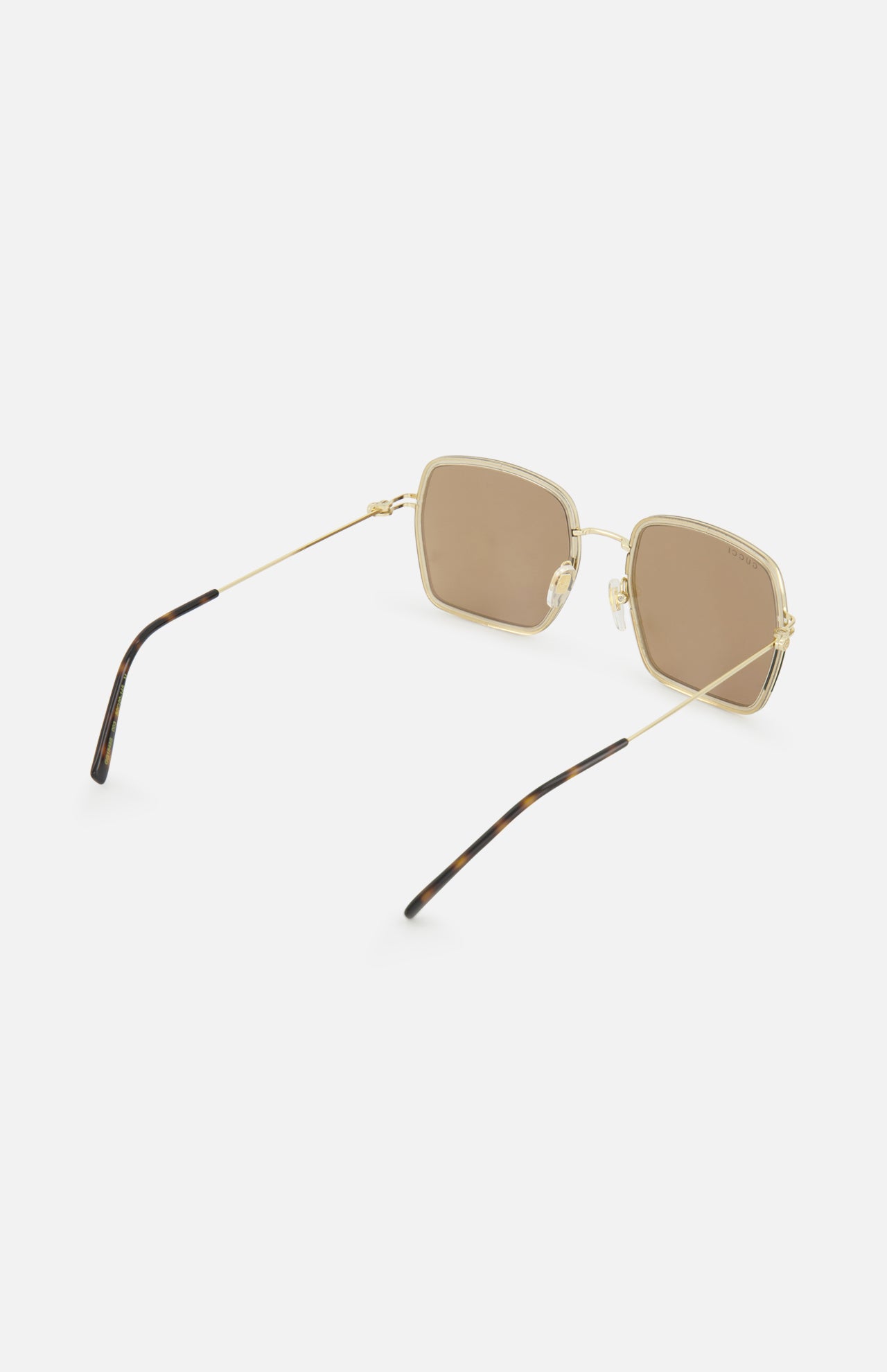 Gucci Square Gold Sunglasses with thin gold frames and brown lenses.