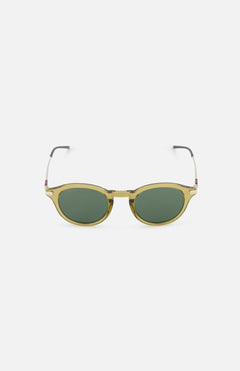 A pair of Gucci Round Brown Sunglasses by GUCCI, featuring brown lenses and a stylish frame, displayed on a plain white background.
