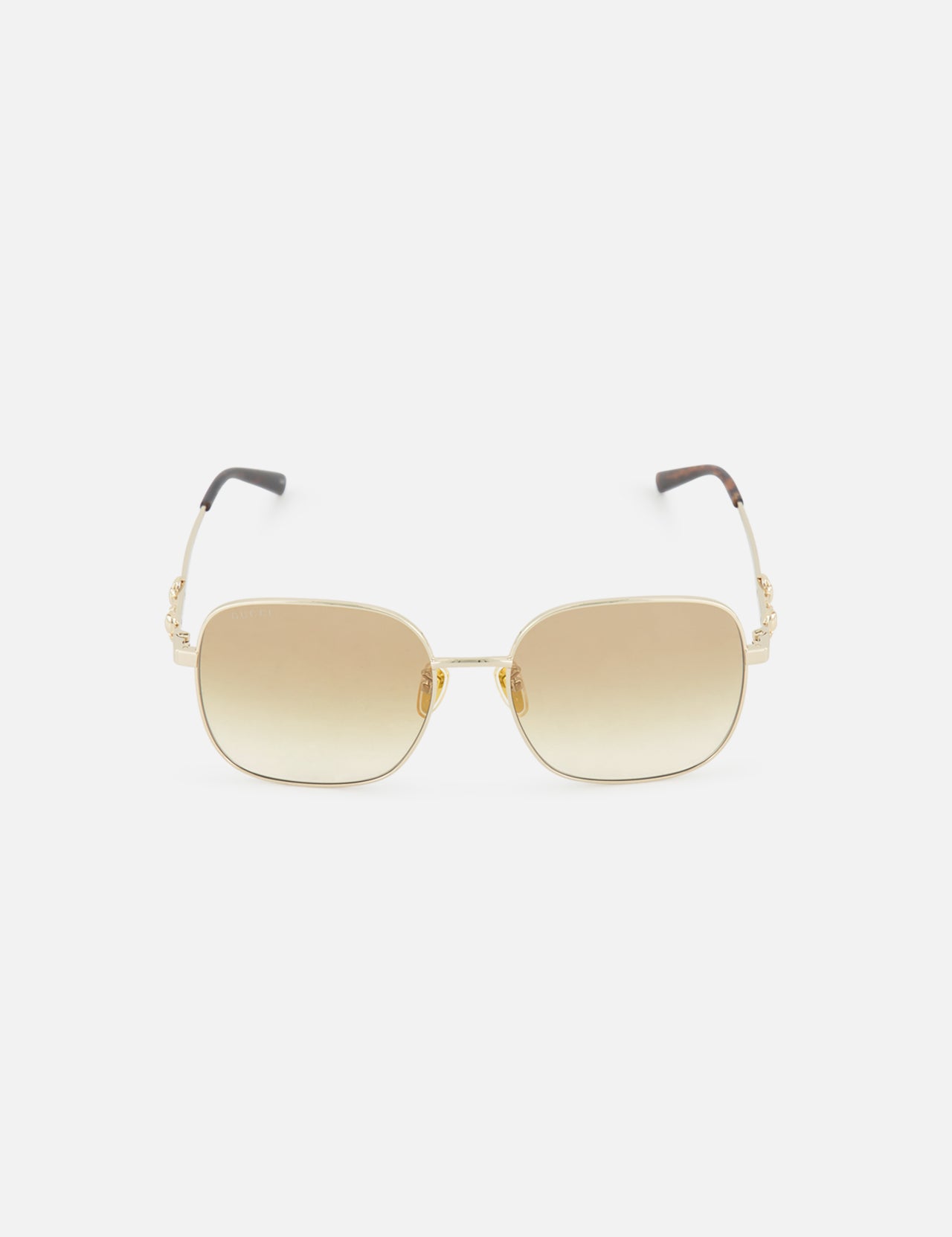 Gucci Rectangle Gold Sunglasses by GUCCI with gold rectangular frames, gradient brown lenses, and black arm tips, shown on a plain white background.