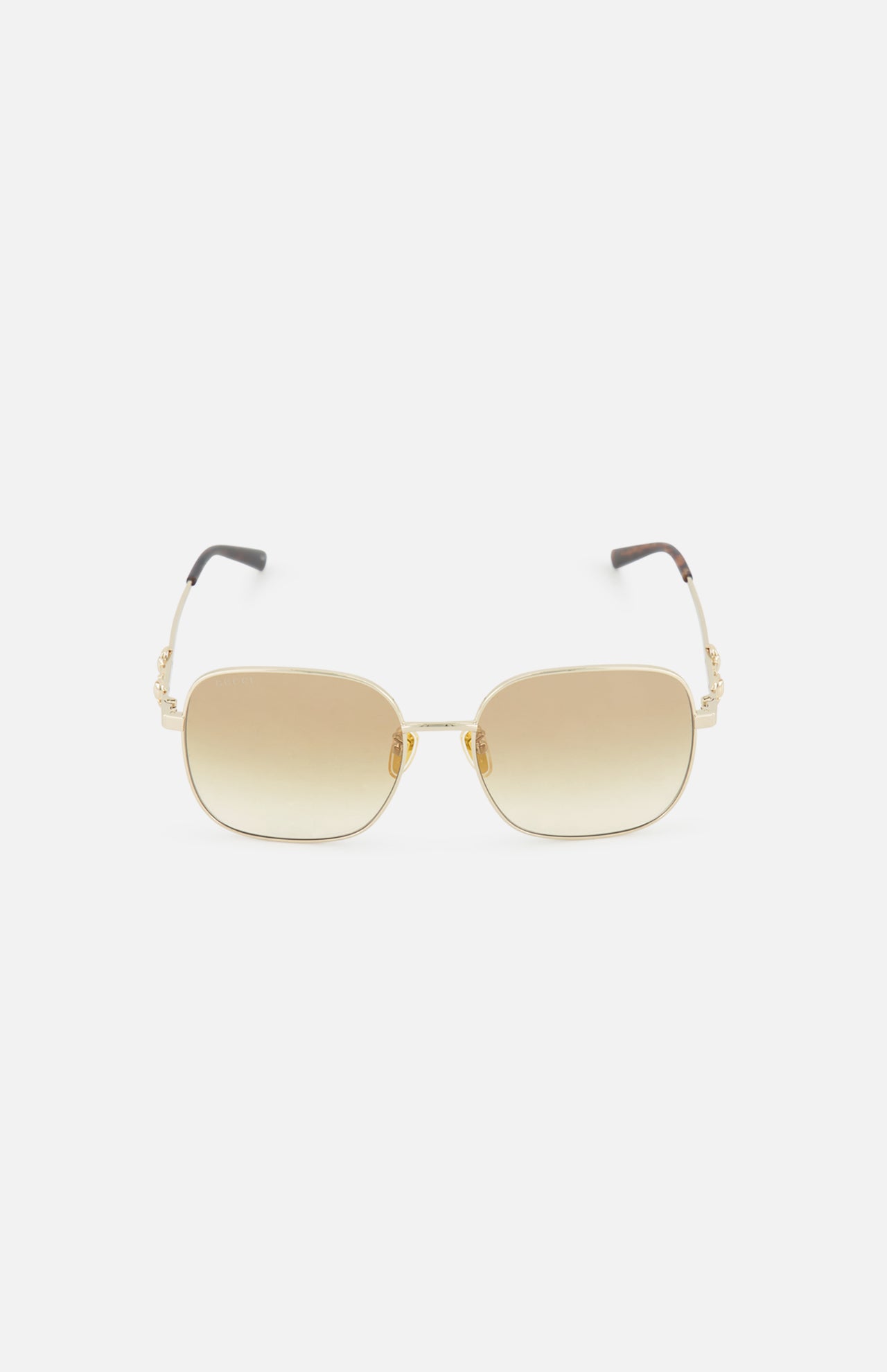 Gucci Rectangle Gold Sunglasses by GUCCI with gold rectangular frames, gradient brown lenses, and black arm tips, shown on a plain white background.