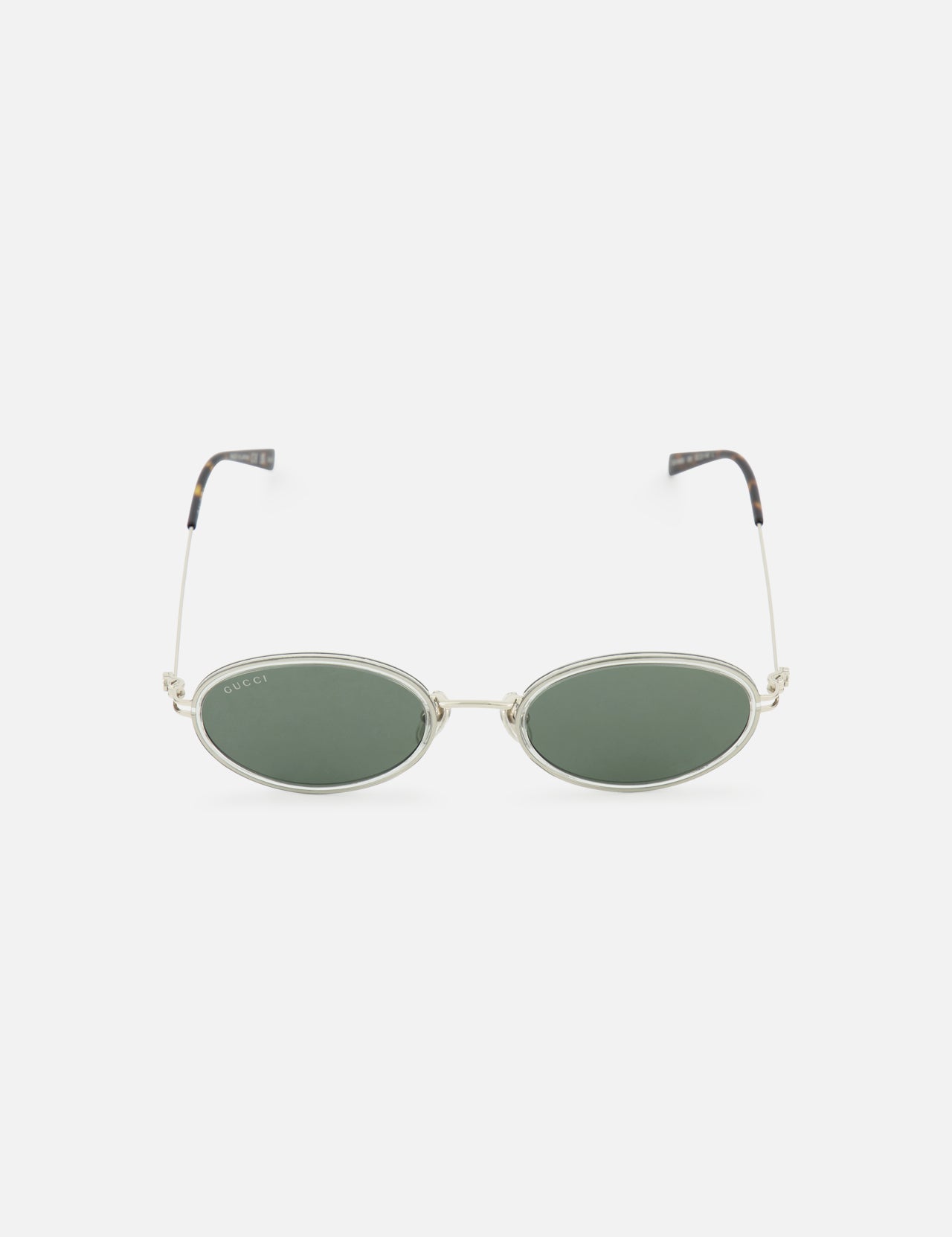 Gucci Oval Metal Sunglasses by GUCCI feature oval green-tinted lenses, slim grey metal frames, and black-tipped arms, displayed on a plain white background.