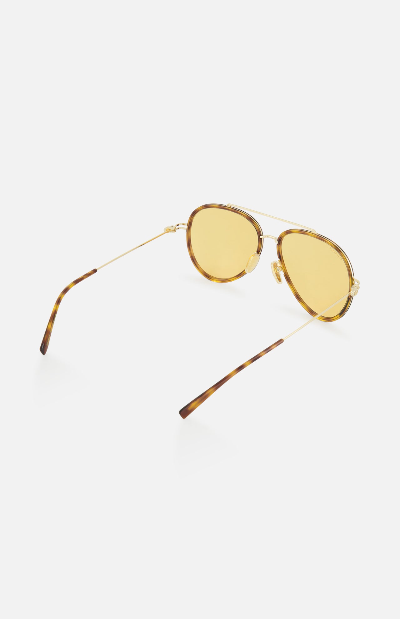 GUCCI Gucci Aviator Brown Sunglasses with orange tinted lenses, gold metal frames, and tortoiseshell-patterned temple tips shown on a white background.