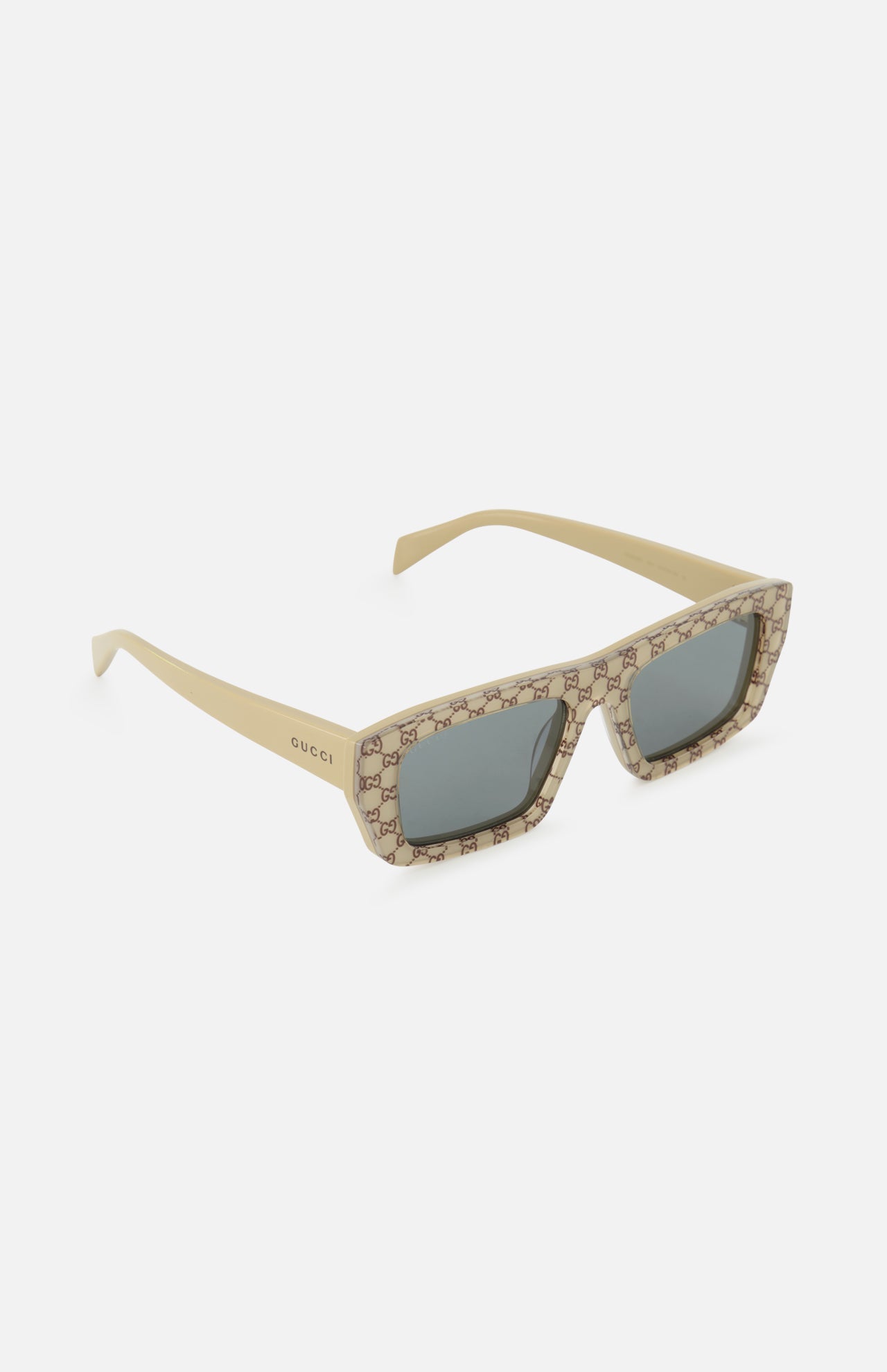GUCCI Gucci Rectangle Beige Sunglasses feature a masculine flat top, rectangular frames, signature logo pattern on front and sides, and dark tinted lenses.