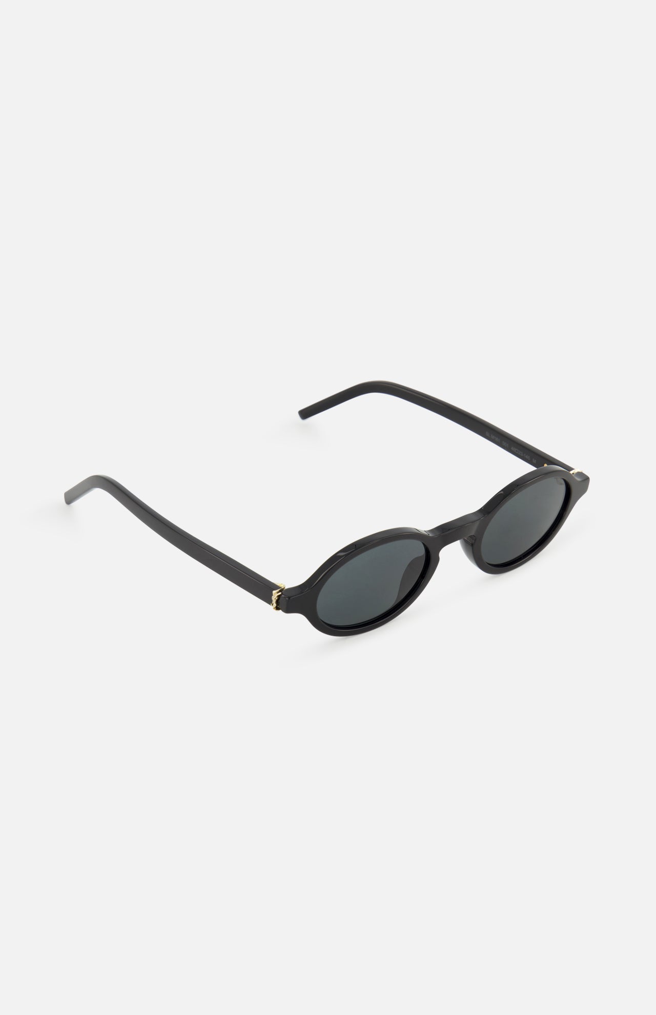 YSL Round Black Sunglasses by YVES SAINT LAURENT feature dark lenses and thin arms in a minimalist design, showcased on a white background at a slight angle.