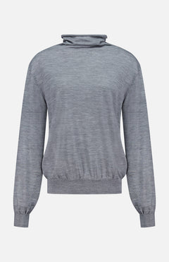 The KHAITE Annette Draped Collar Sweater is a long-sleeve, light grey turtleneck with a loose fit and ribbed cuffs and waistband, made in Italy and shown against a plain white background.