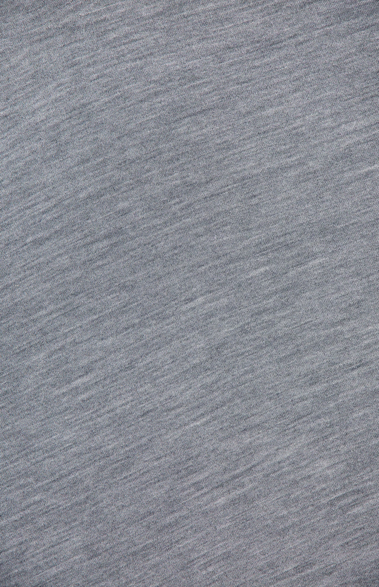 A close-up of the Annette Draped Collar Sweater by KHAITE shows its grey heathered fabric with subtle horizontal lines and a soft, woven texture.