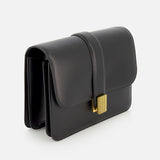 The KHAITE Blake Leather Crossbody Bag in black features Italian craftsmanship, a fold-over flap, gold clasp, adjustable strap, and structured rectangular shape, shown against a white background.