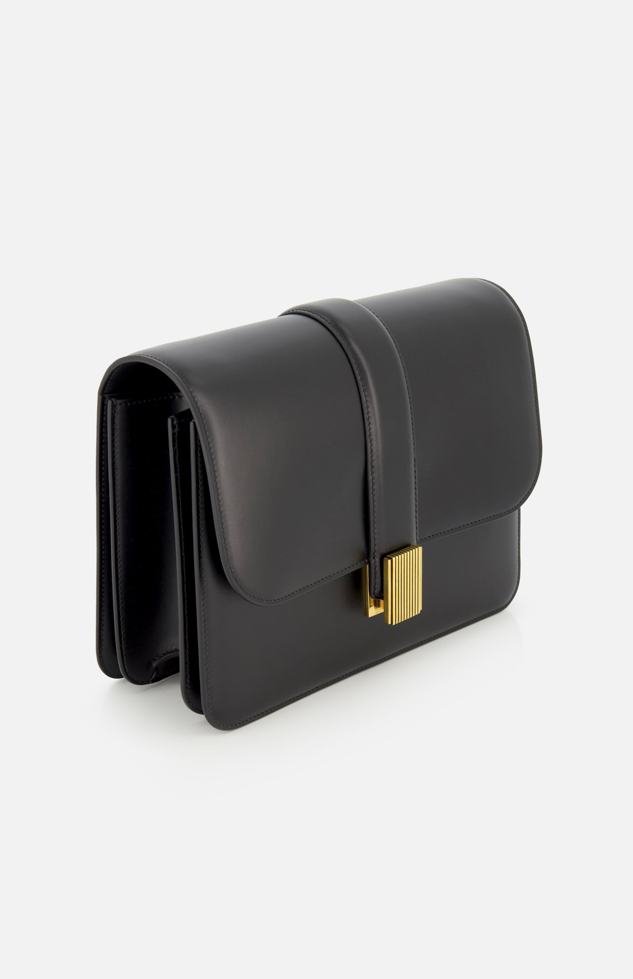 The KHAITE Blake Leather Crossbody Bag in black features Italian craftsmanship, a fold-over flap, gold clasp, adjustable strap, and structured rectangular shape, shown against a white background.