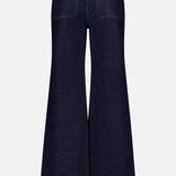 Back view of the KHAITE Delmonico Wide Leg Jean in Benson, featuring a high-waisted, wide-leg dark wash design with two rear pockets and orange stitching, shown against a plain white background.