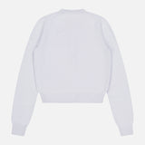 The KHAITE Everheart Suede Button Cardigan, a minimalist long-sleeve knit with ribbed cuffs, hem, and collar, is displayed flat with the back facing up against a white background.