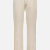 The KHAITE Finley Jean in Dumas is a pair of straight-leg, mid-rise beige jeans in stretch-free denim with five pockets, belt loops, and a button fly, shown against a white background.