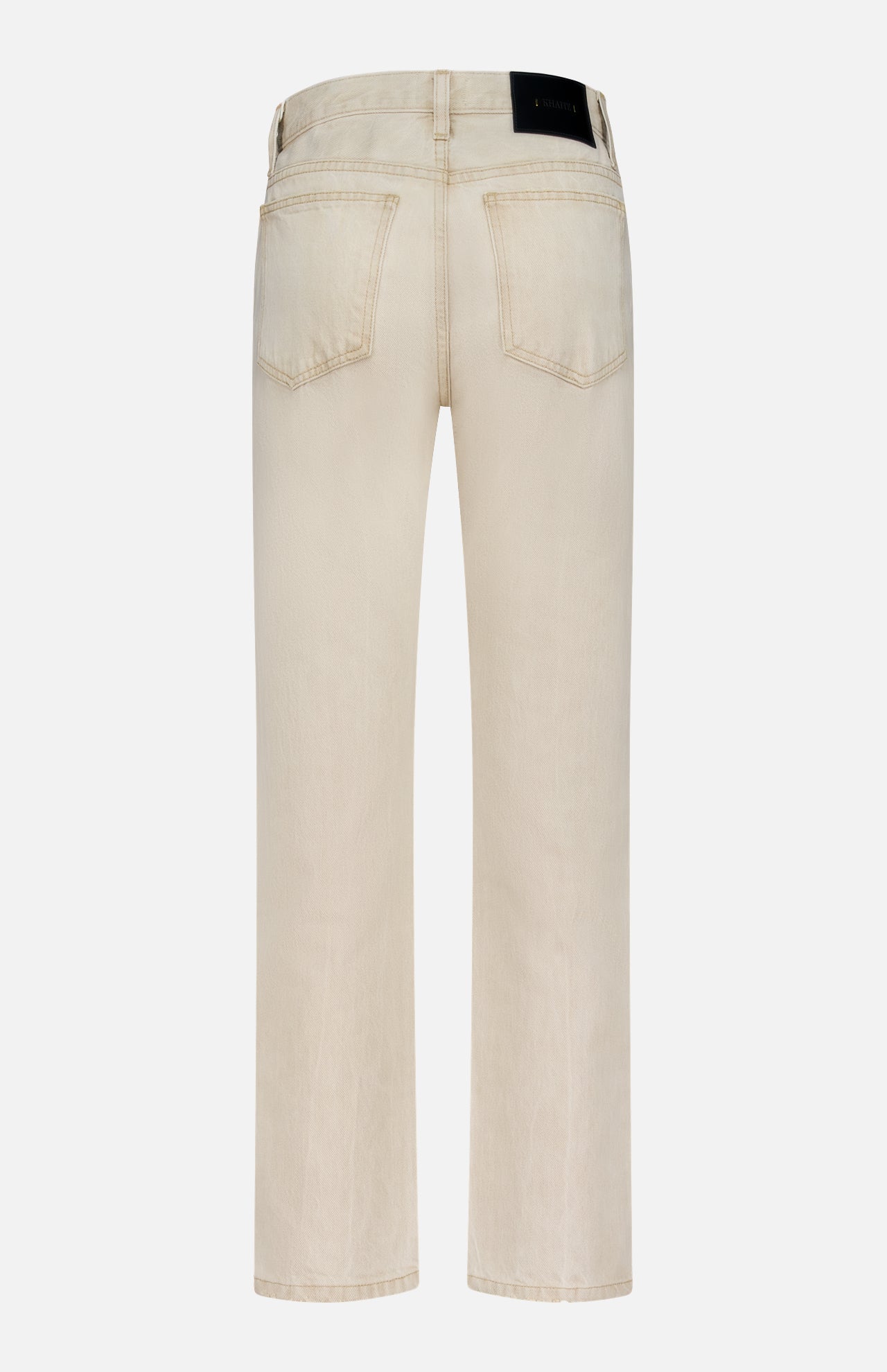 Back view of KHAITE’s Finley Jean in Dumas: light beige, stretch-free denim jeans with straight legs, two rear pockets, and a black rectangular waistband label, shown against a plain white background.