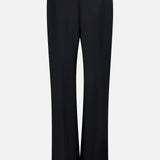 Back view of the KHAITE Grenare Straight Leg Pant in black wool, showcasing a tailored fit with belt loops and neatly pressed creases, made in Italy and displayed against a plain white background.