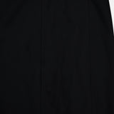 A close-up of the KHAITE Lyle Column Skirt in plain black fabric, featuring subtle vertical seams—perfect for a minimalist wardrobe—shown against a white background.