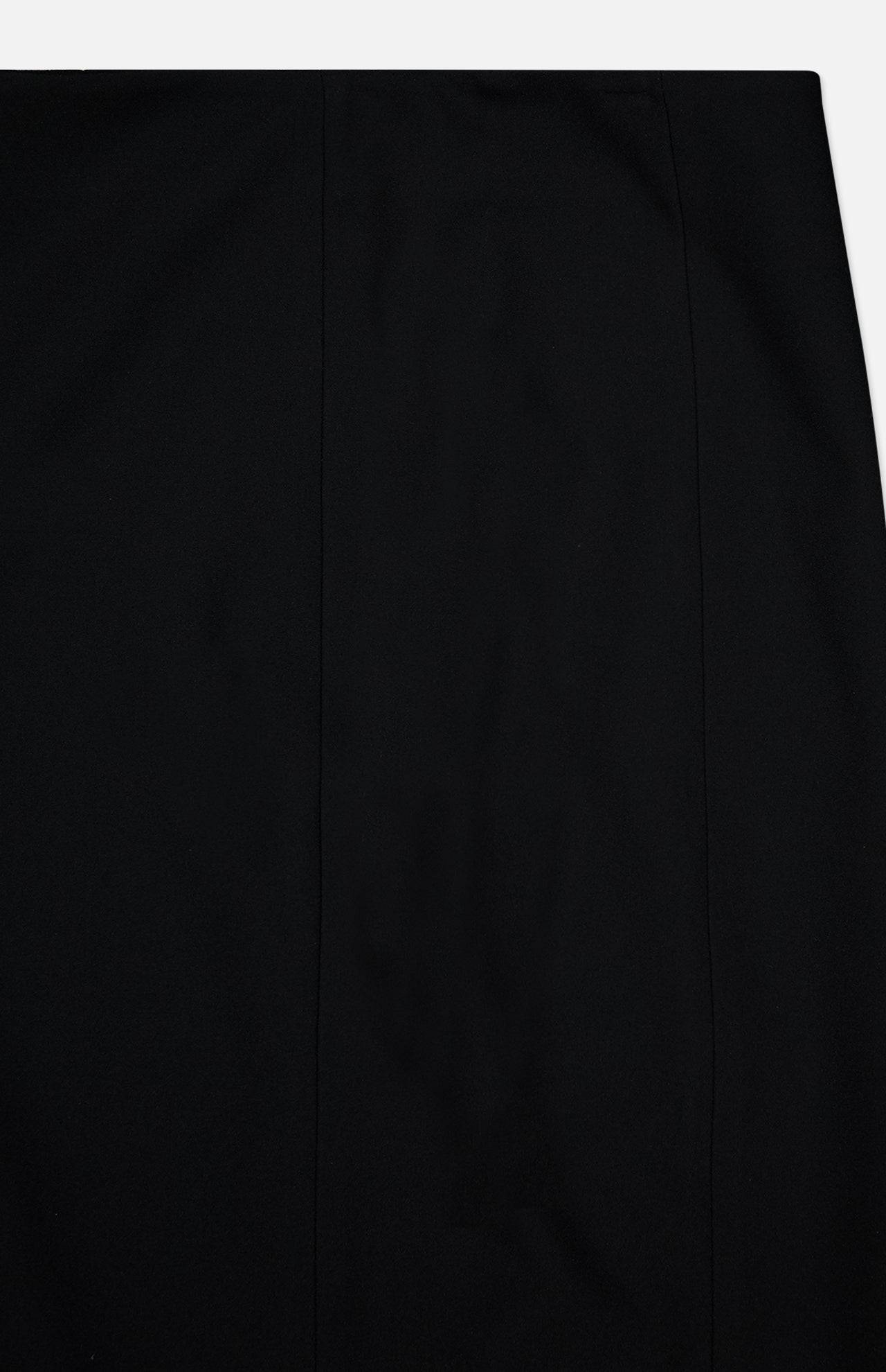 A close-up of the KHAITE Lyle Column Skirt in plain black fabric, featuring subtle vertical seams—perfect for a minimalist wardrobe—shown against a white background.