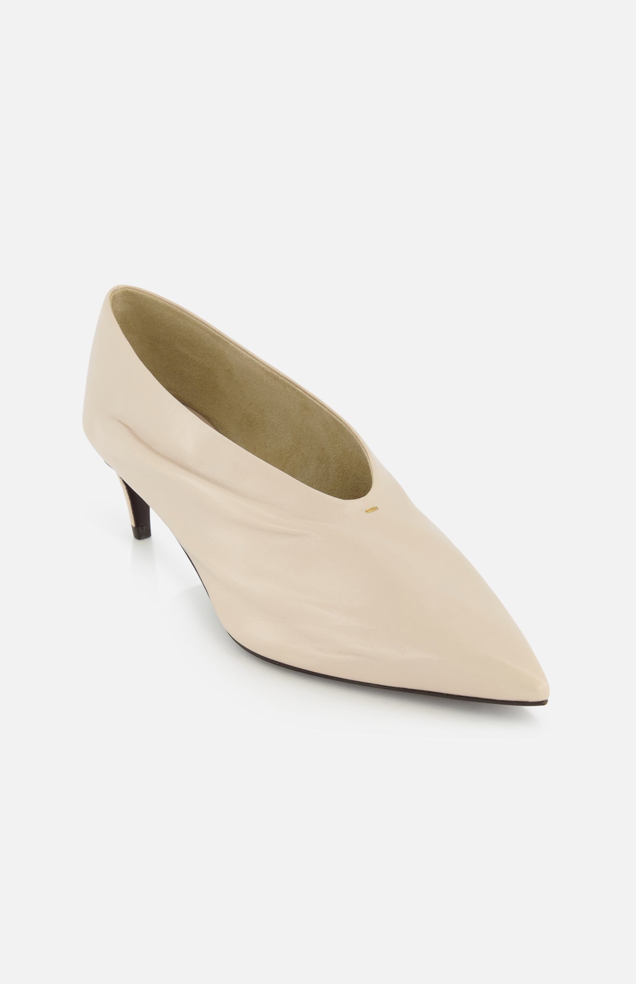 The KHAITE Miriam Glazed Leather Pump 50 features nude glazed leather, a pointed toe, and a low heel with a smooth finish—ideal for minimalist wardrobes and shown on a white background.