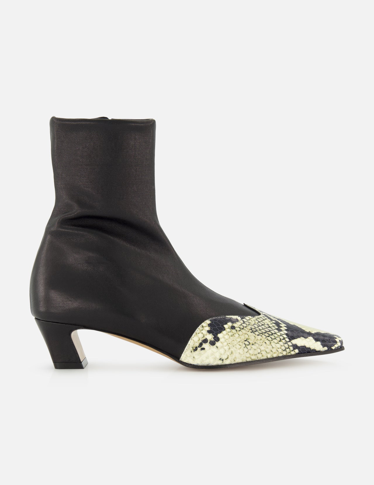 The KHAITE Nevada Ankle Stretch Boot in Python is a sleek black mid-calf boot with a low heel and pointed toe, highlighted by a contrasting light snakeskin pattern for added style.