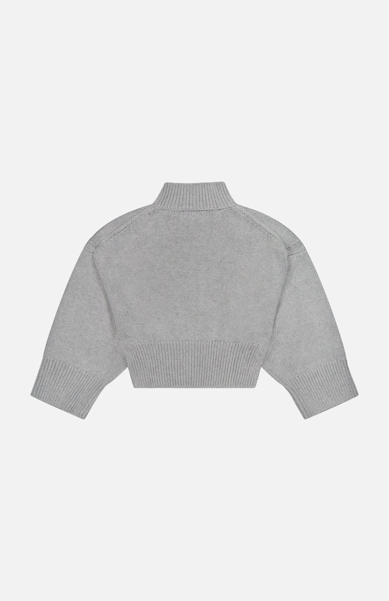 The KHAITE Phelps Cashmere Sweater is displayed flat against a white background, showcasing its gray hue, long sleeves, cropped silhouette, high neckline, ribbed cuffs, and waistband—making it a refined choice for any minimalist wardrobe.