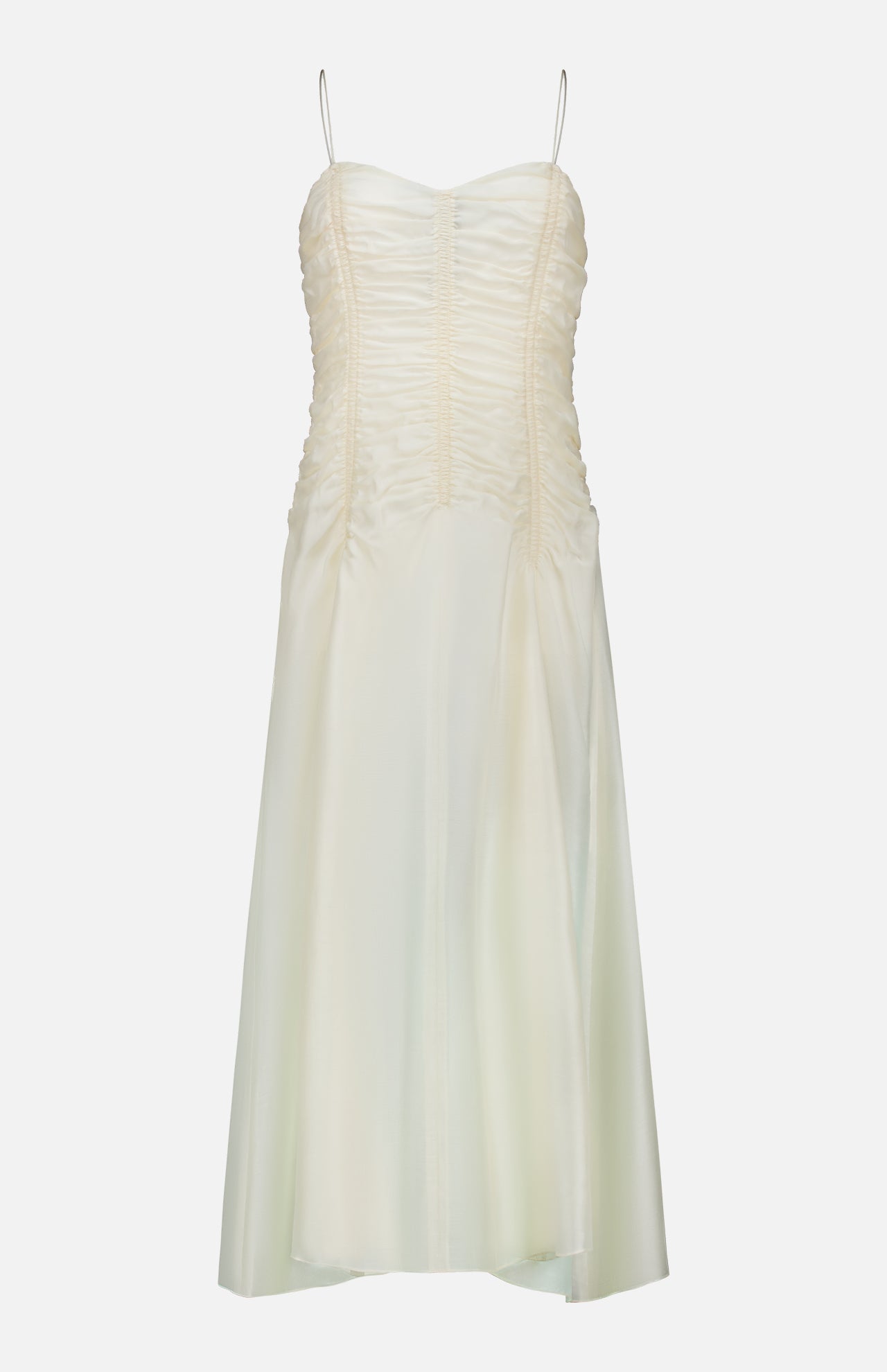 The Raina Ruched Midi Dress by KHAITE is an ivory silk charmeuse dress featuring a sleeveless silhouette, delicate spaghetti straps, and ruched detailing on the bodice. This midi dress flares gently with a subtle sheer finish and is photographed against a plain white background.