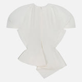 The Rumi Asymmetric Hem Top by KHAITE is a white, short-sleeve blouse crafted from a linen-viscose-silk blend, featuring exaggerated structured shoulders and an asymmetric hem. Displayed flat on a plain white background, the fabric has a smooth, slightly glossy finish.