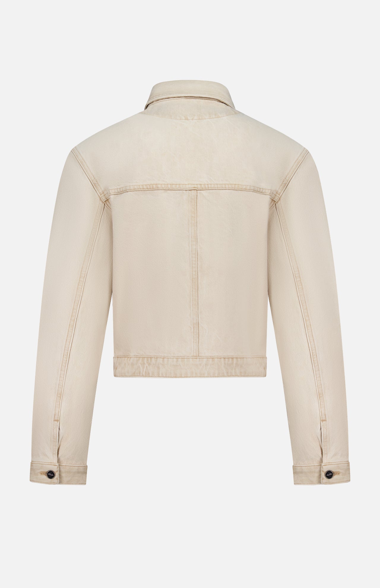 Back view of the KHAITE Tomer Collared Cropped Denim Jacket in beige, featuring long sleeves, a collar, buttoned cuffs, and seam detailing—an ideal minimalist piece—displayed against a plain white background.