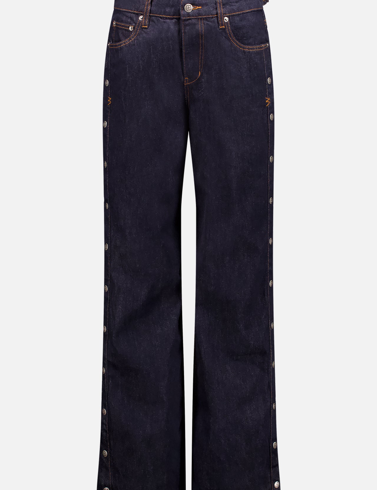 The KSUBI Low Rider Original Jean features a dark blue wash, straight leg fit, front and back pockets, brown stitching, silver snap buttons along the outer legs, and adjustable waist tabs for a personalized fit.