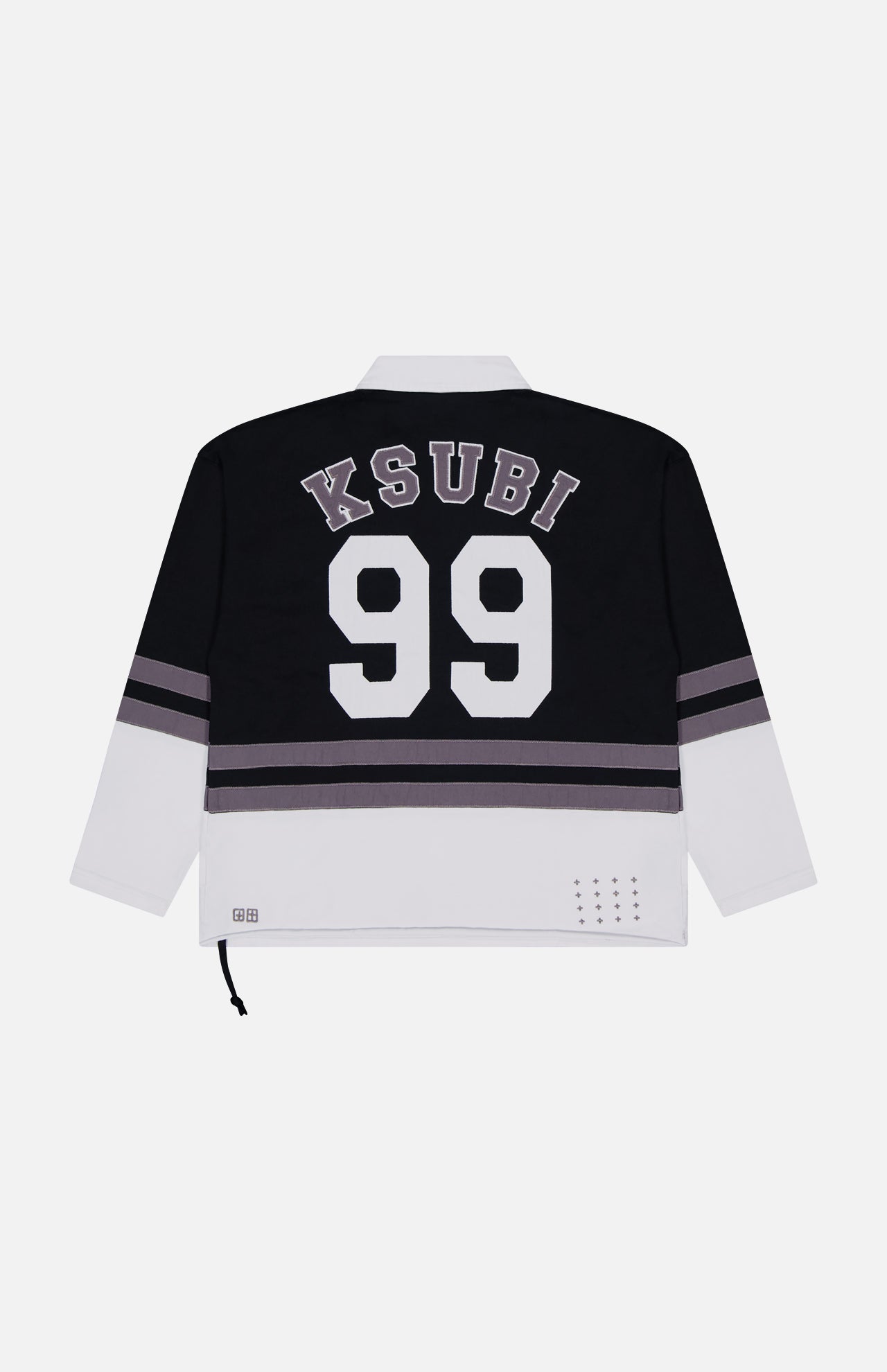 The Duke Rugby Long Sleeve Jersey Shirt by KSUBI is an oversized black collared top with bold "KSUBI" and "99" on the back, plus gray and black striped sleeves for a collegiate vibe.
