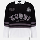 The KSUBI Duke Rugby Long Sleeve Jersey Shirt features black, white, and gray panels with a white collar, "KSUBI est. 1999" on the front, scripted city names above the left chest, and a crest on the right for a collegiate-inspired look.