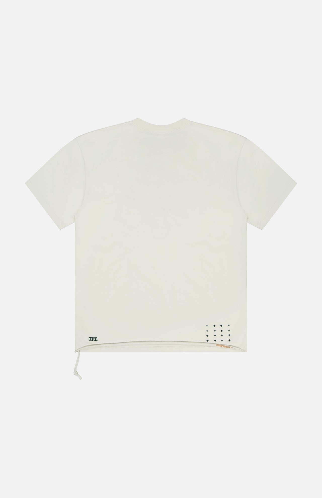 Back view of the KSUBI Prestige Biggie Short Sleeve T-shirt in antique white premium cotton, featuring an oversized fit, a left-side drawstring at the hem, and small black print details near the lower right hem.